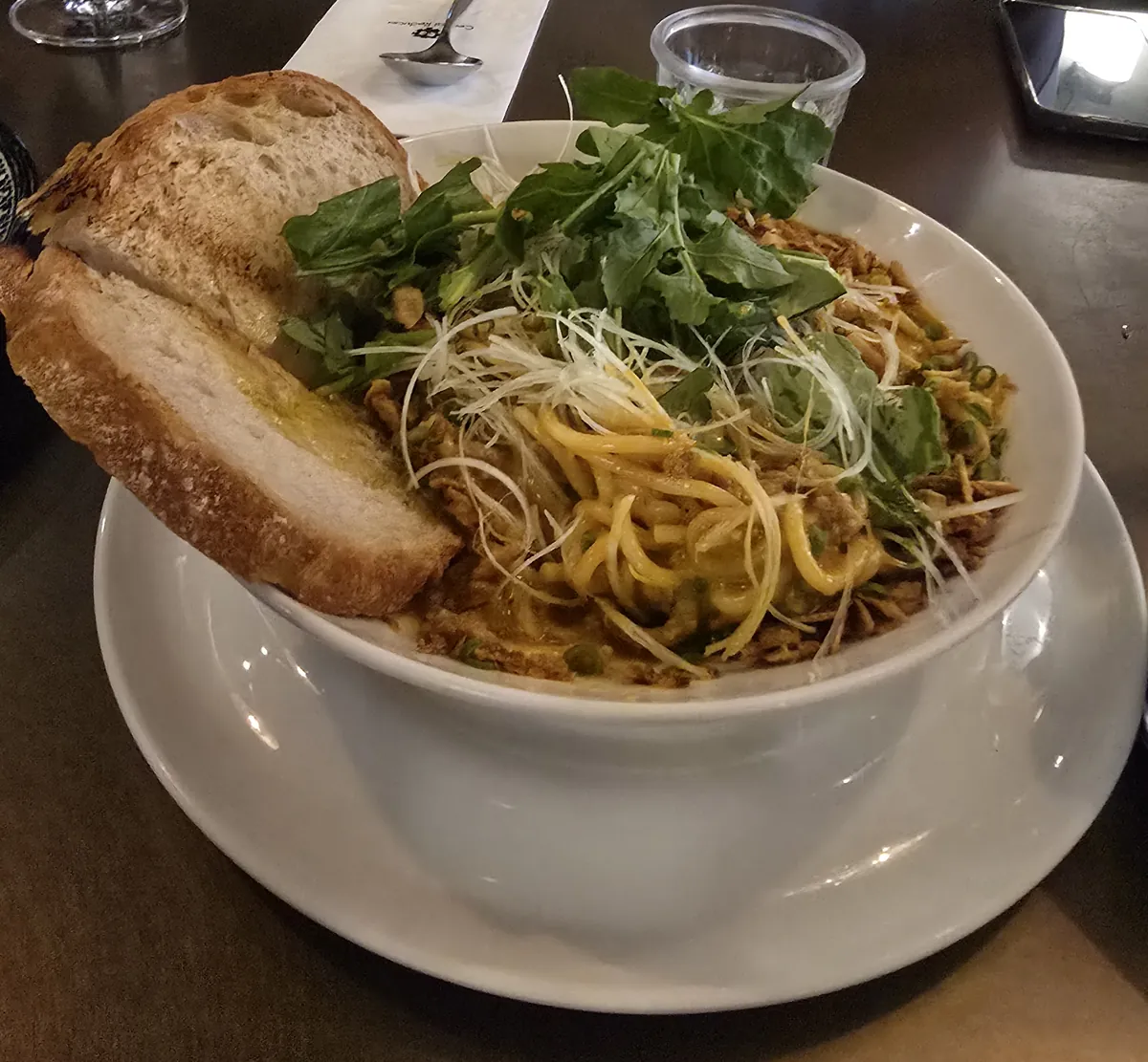 Seafood basil jjamppong noodle bowl with crusty bread at Central Reducer Seongsu Seoul