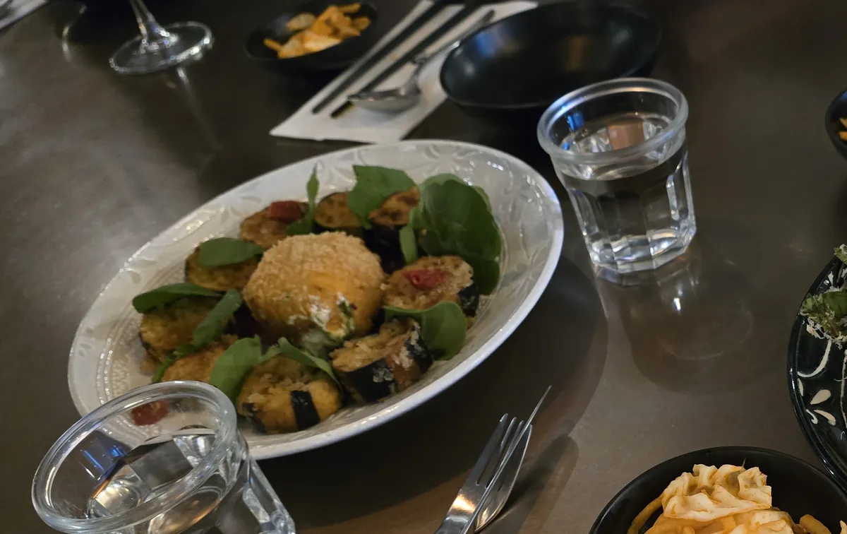 Table spread at Central Reducer — appetizers and mains