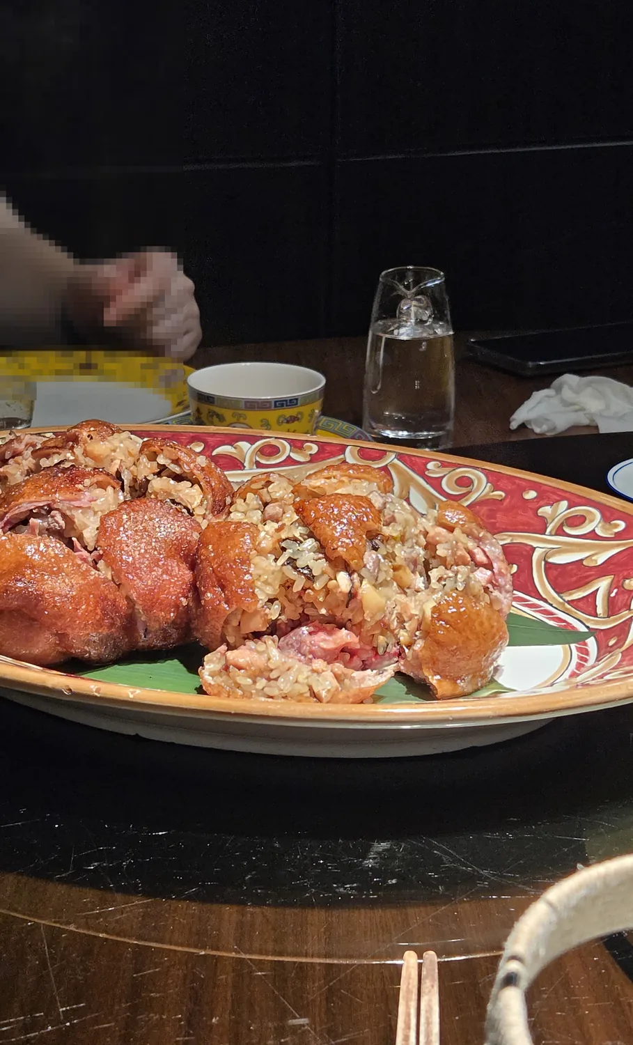 Eight-treasure duck opened showing the glutinous rice stuffing