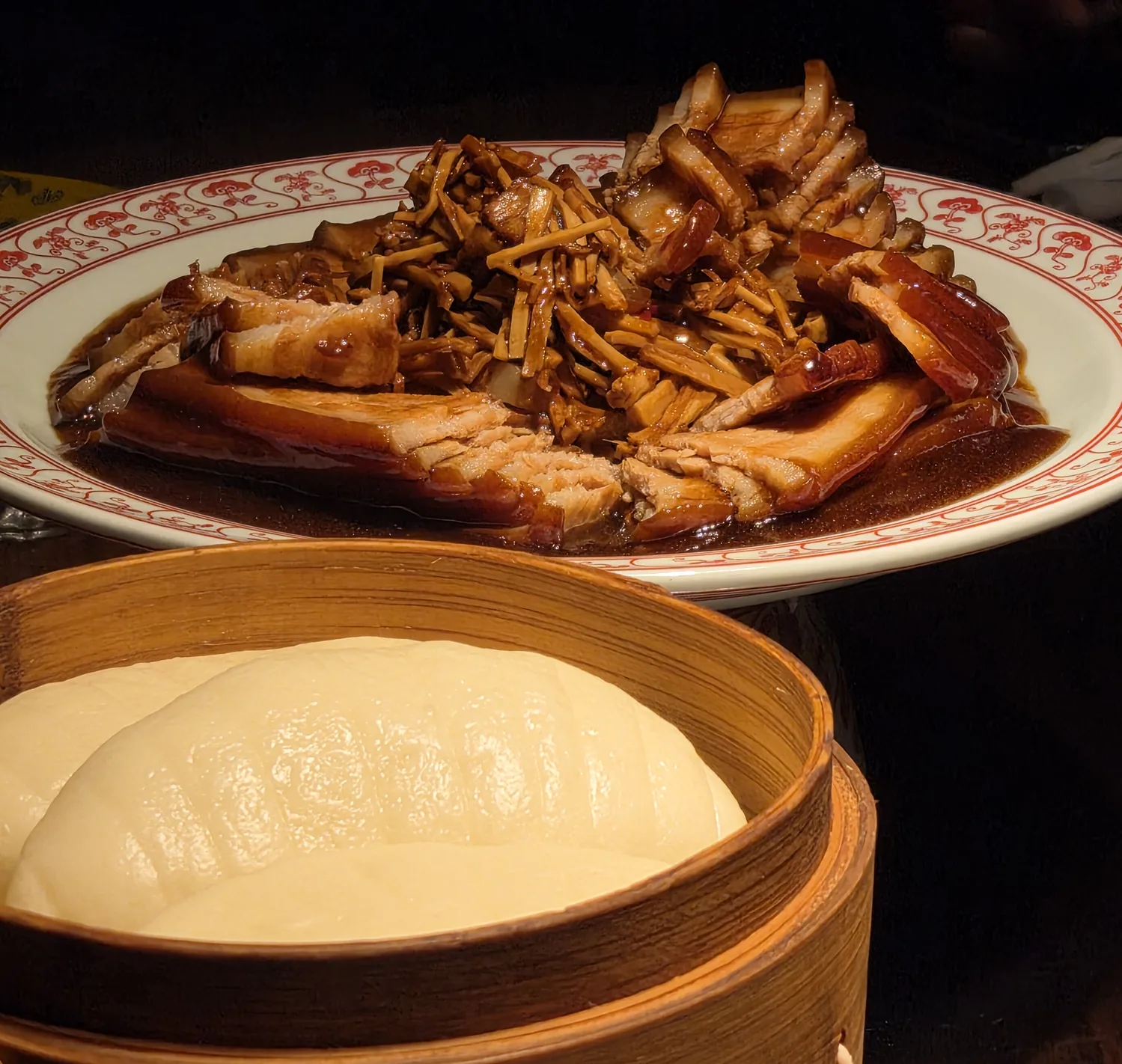 Pagoda pork cut at the table showing bamboo shoots inside