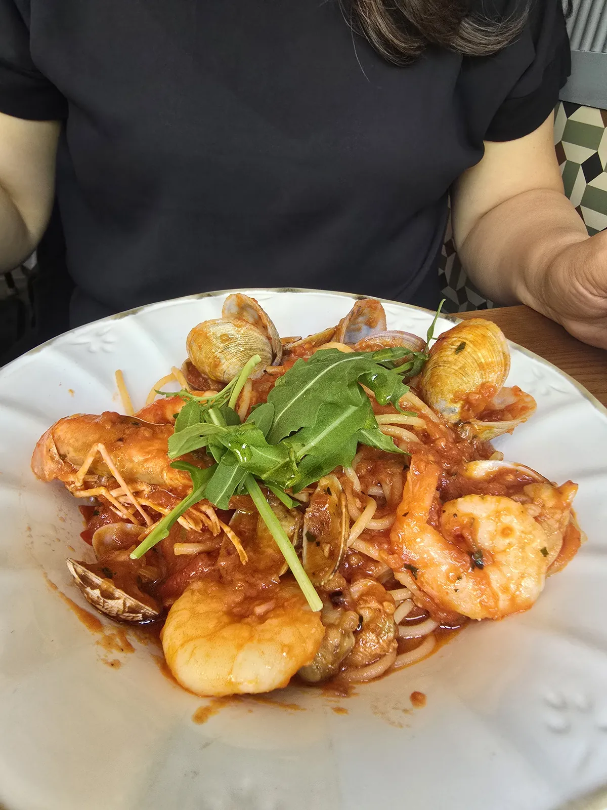 Seafood tomato pasta with clams and shrimp