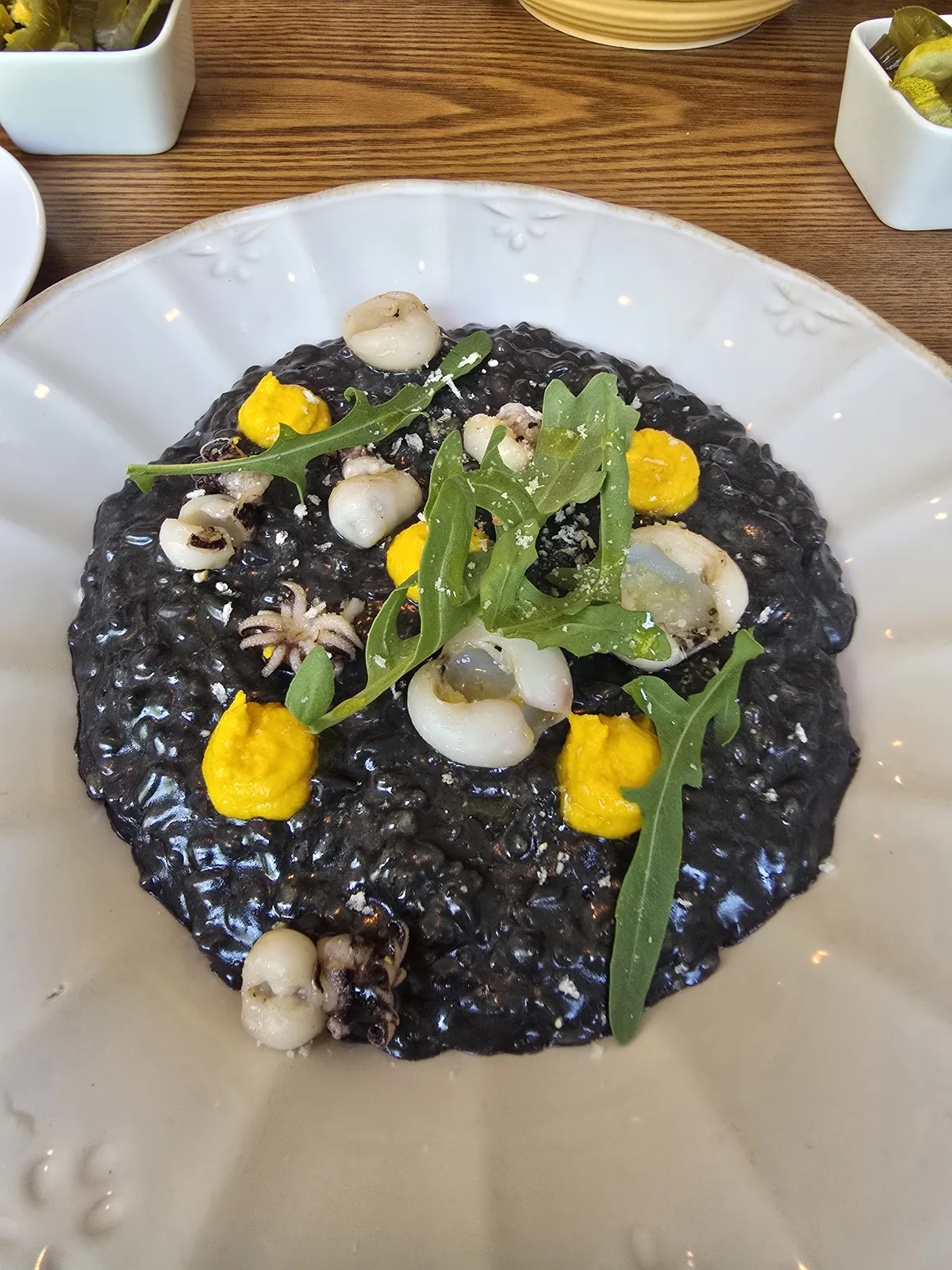 Squid ink risotto with baby octopus and arugula at Miette Italian restaurant near Yangjae Stream Seoul