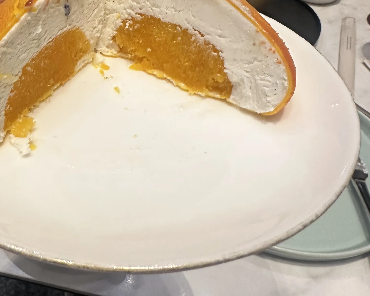 Valrhona chocolate mango cut open showing the creamy mango center