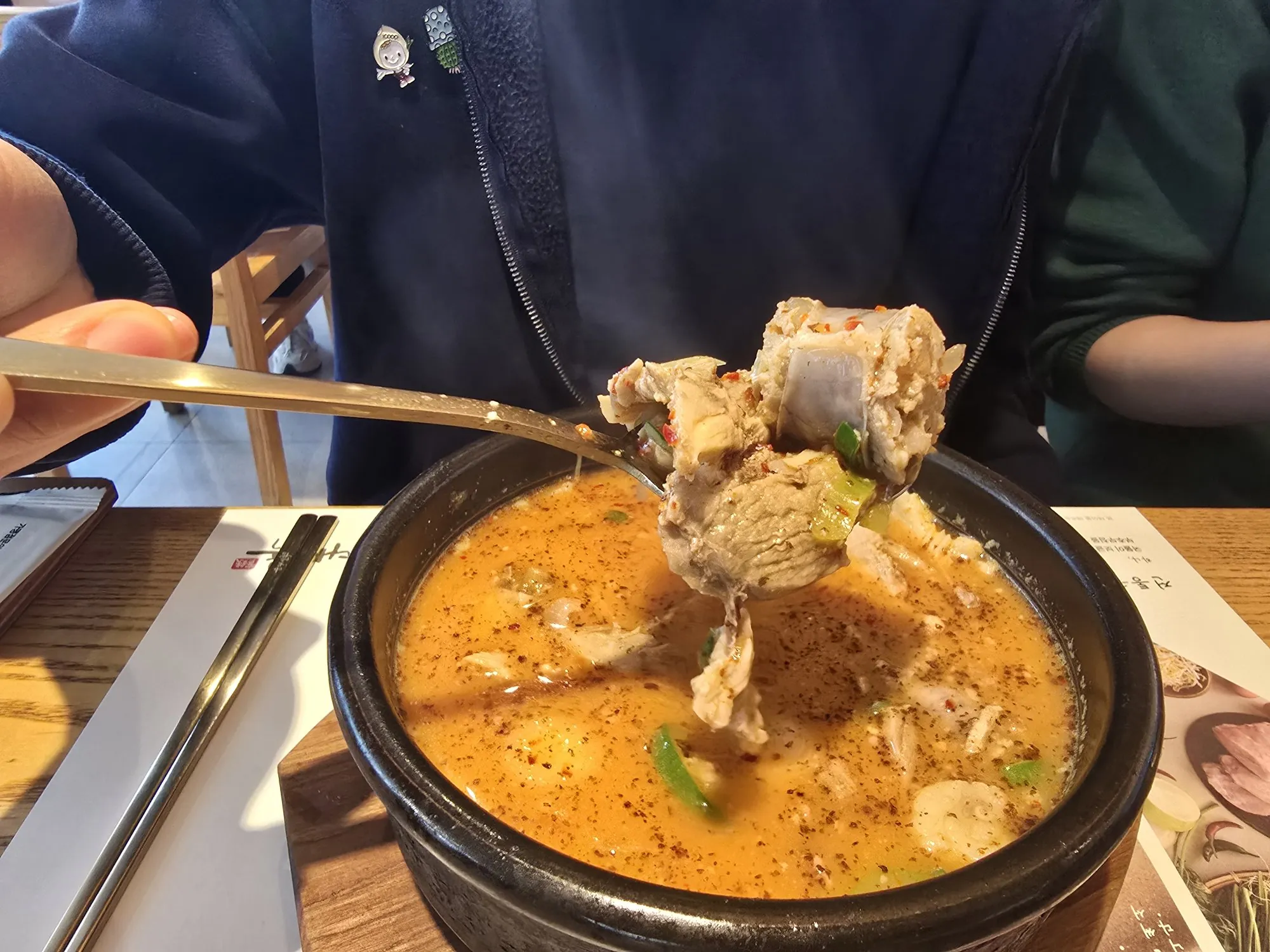 Sundaeguk closeup — thick chunks of sundae and pork